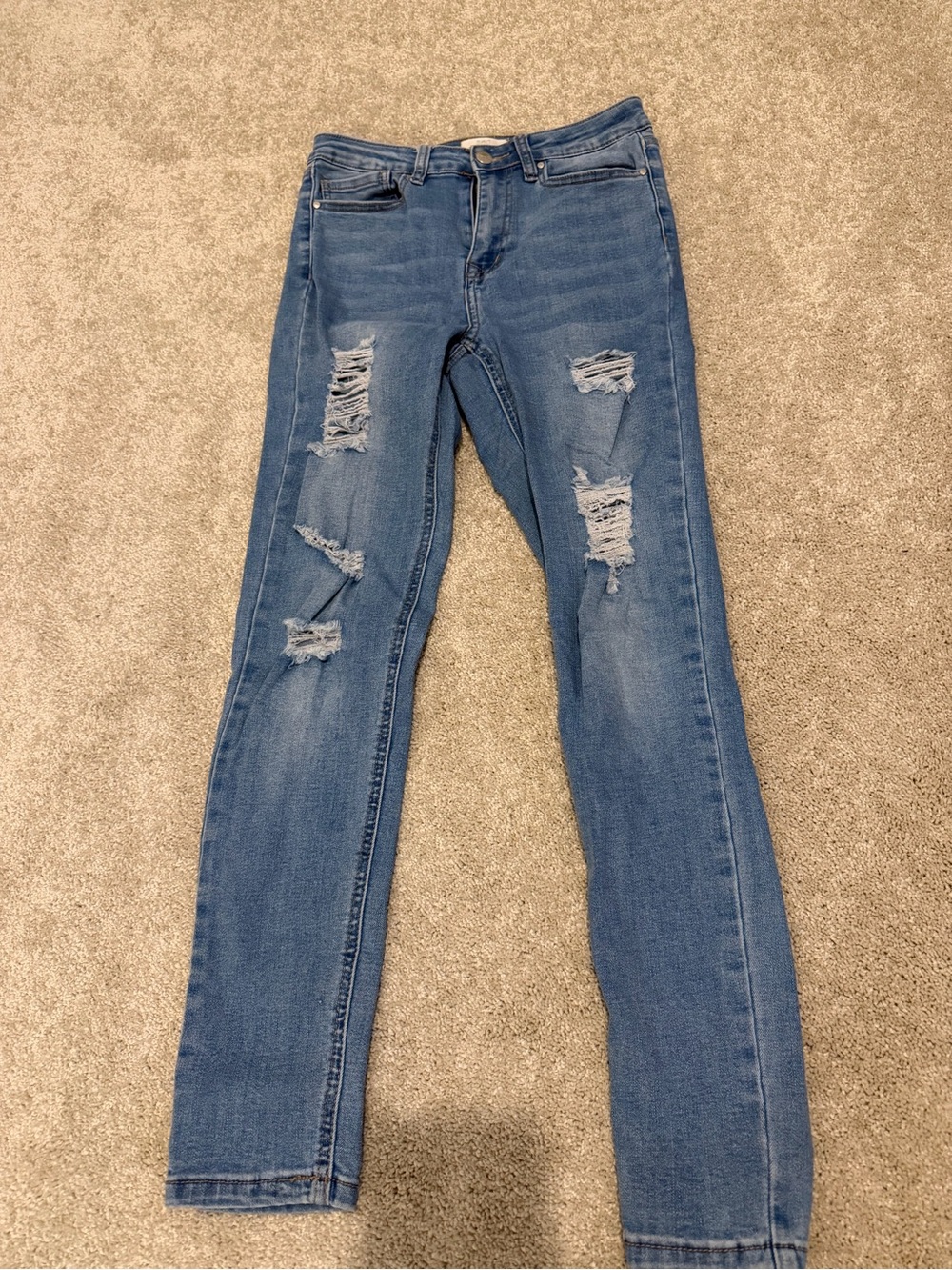 Women's Distressed Skinny Jeans in Blue